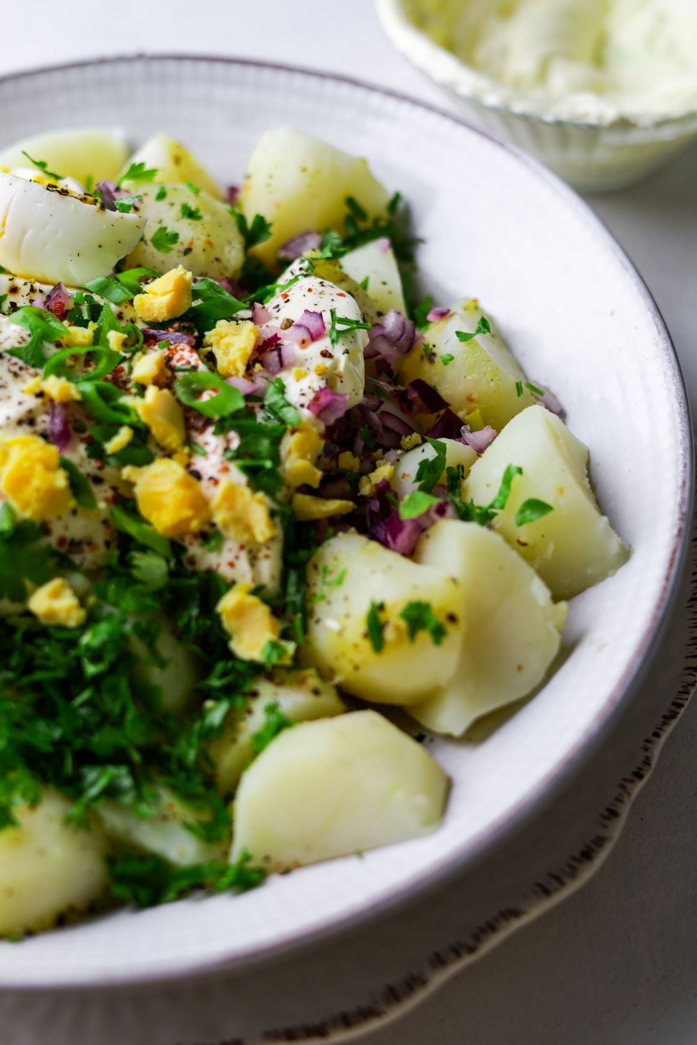 Creamy Potato Salad in a white bowl