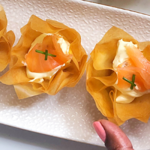 Phyllo cups filled with a cream cheese filling and topped with Salmon