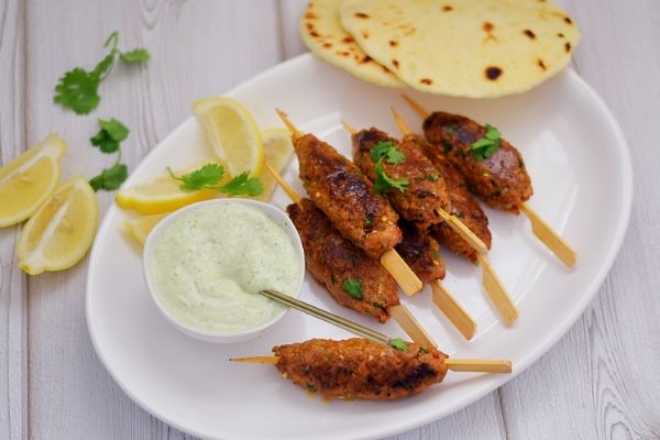 Lamb mince on skewers served on a platter