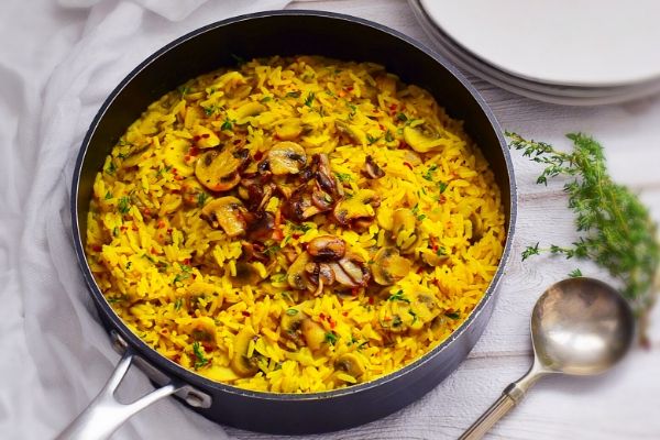 Mushroom Pilaf Rice in a black pan
