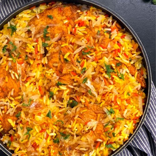 Fish Biryani in a black pot