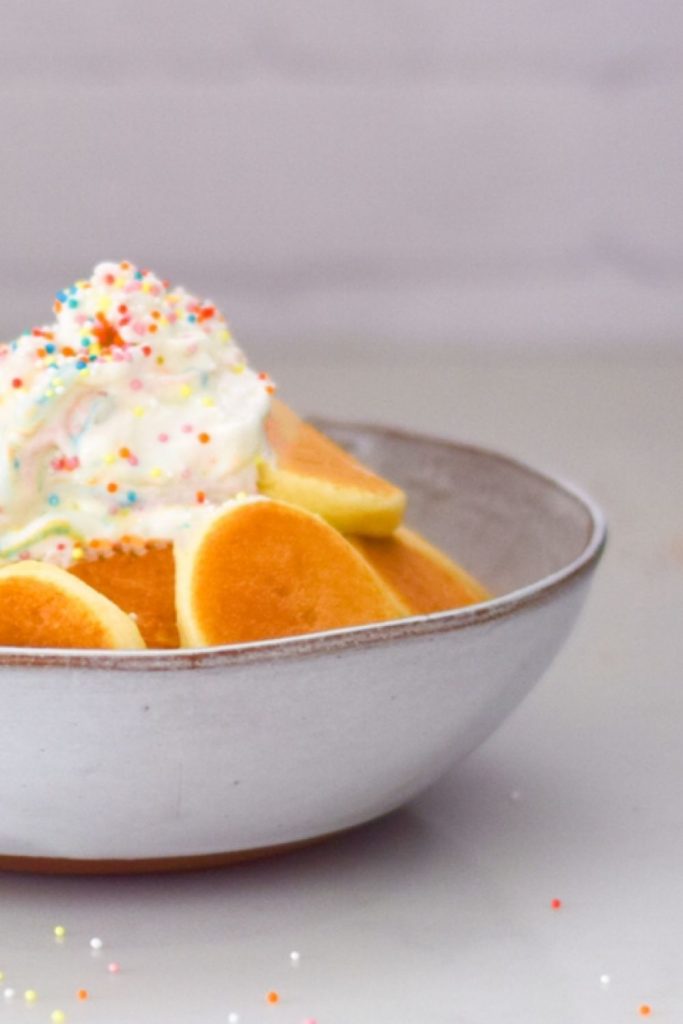 Cereal Pancakes topped with whipped cream