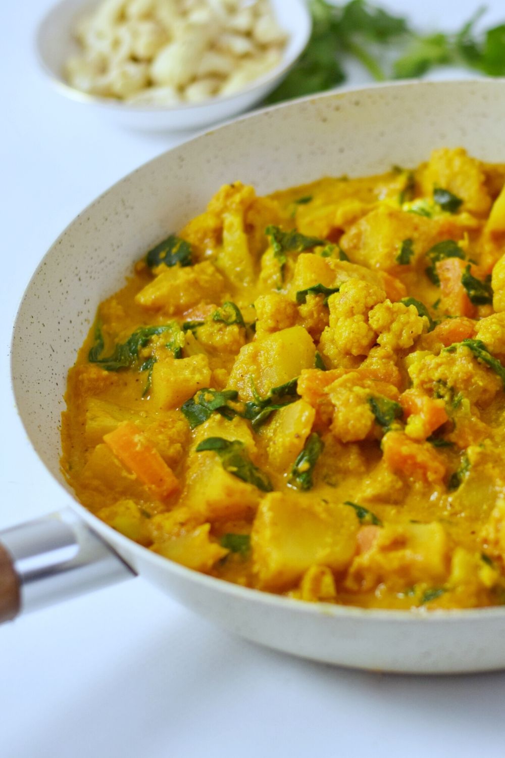 Creamy Vegetable Korma in a white pan