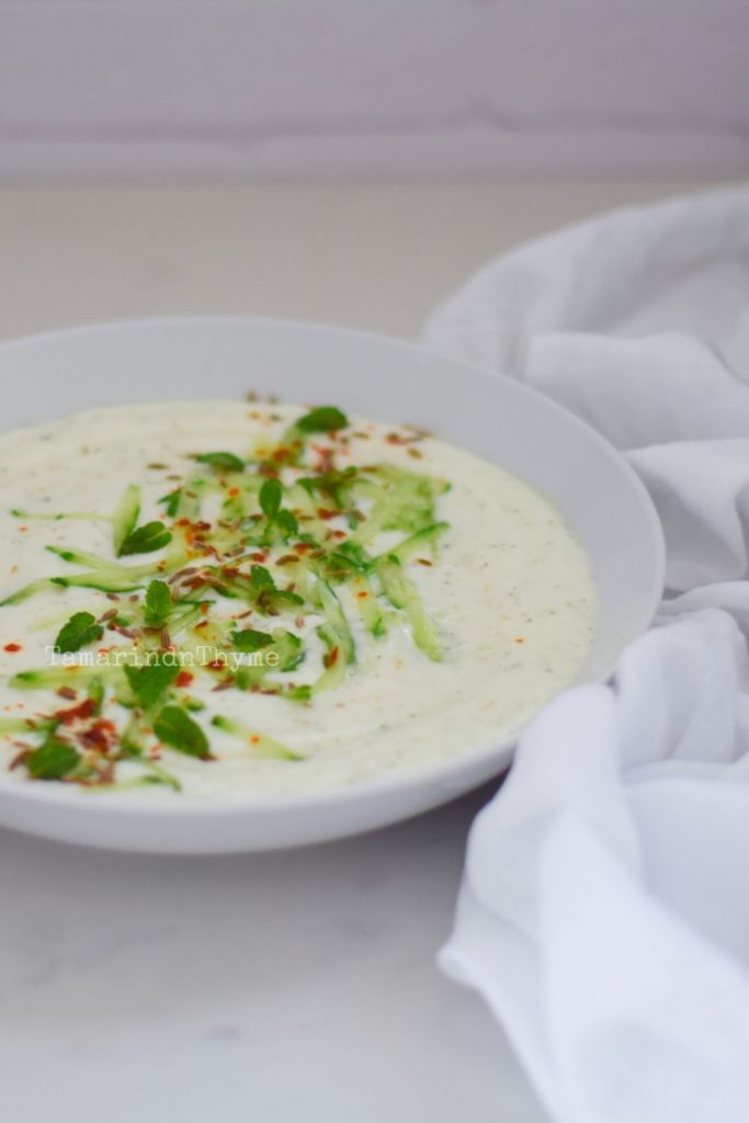 Cucumber and Herb Raita in a white bowl