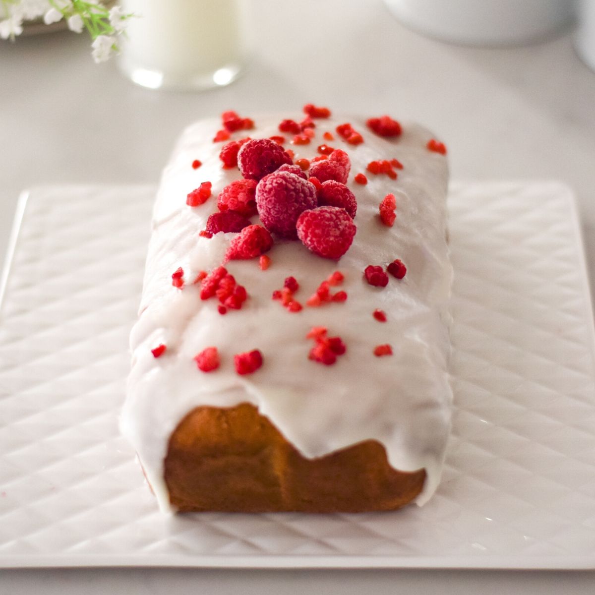 Raspberry Rose Loaf on a white platter