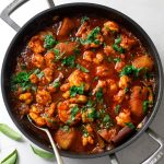 Prawn and Potato Curry in a black pot
