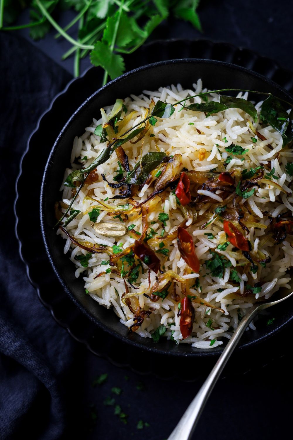 Cumin Rice in a black bowl