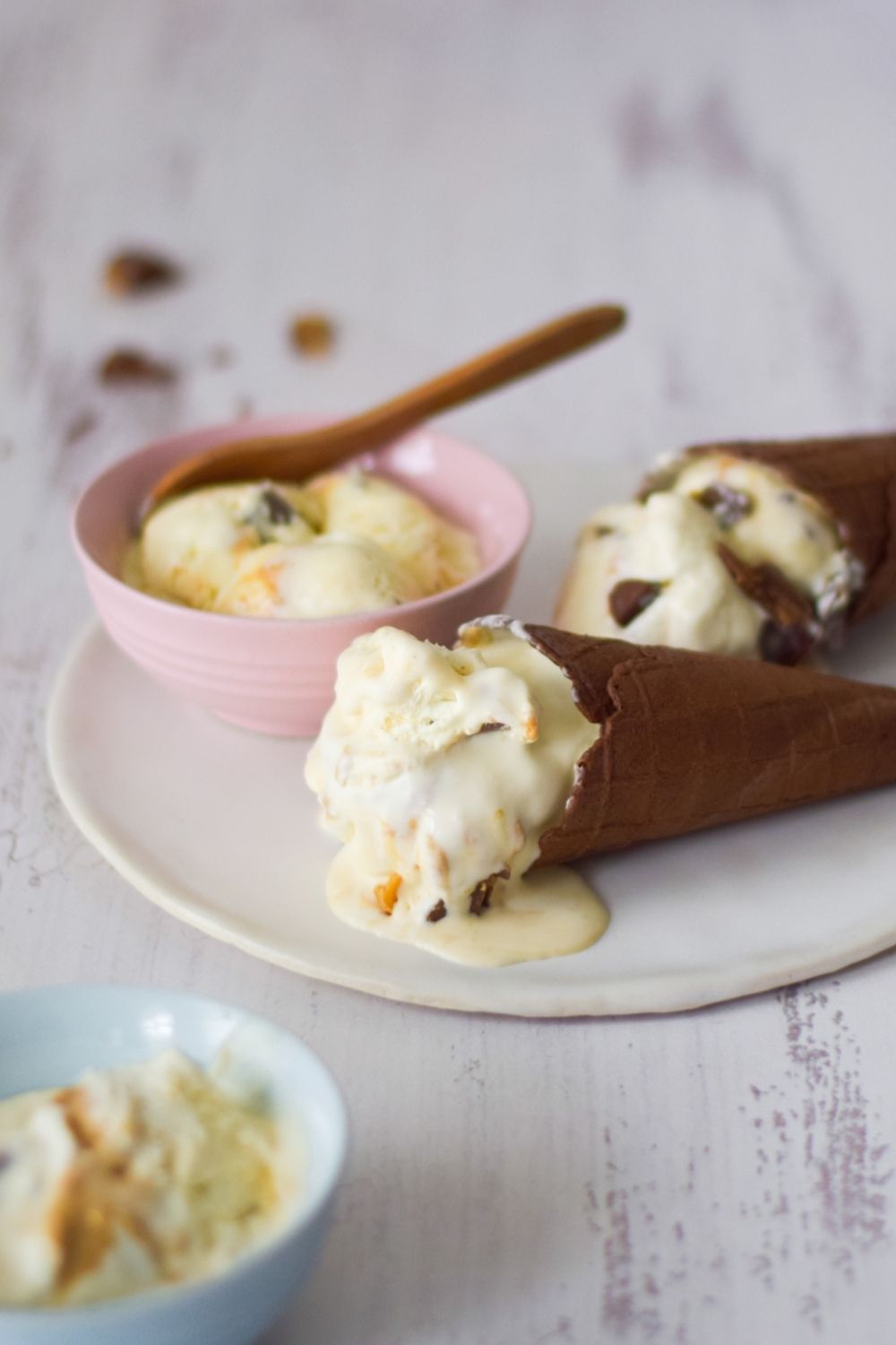 No Churn Caramel Ice-Cream in cones and in a bowl