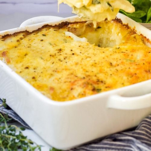 Scalloped Potatoes in a white dish