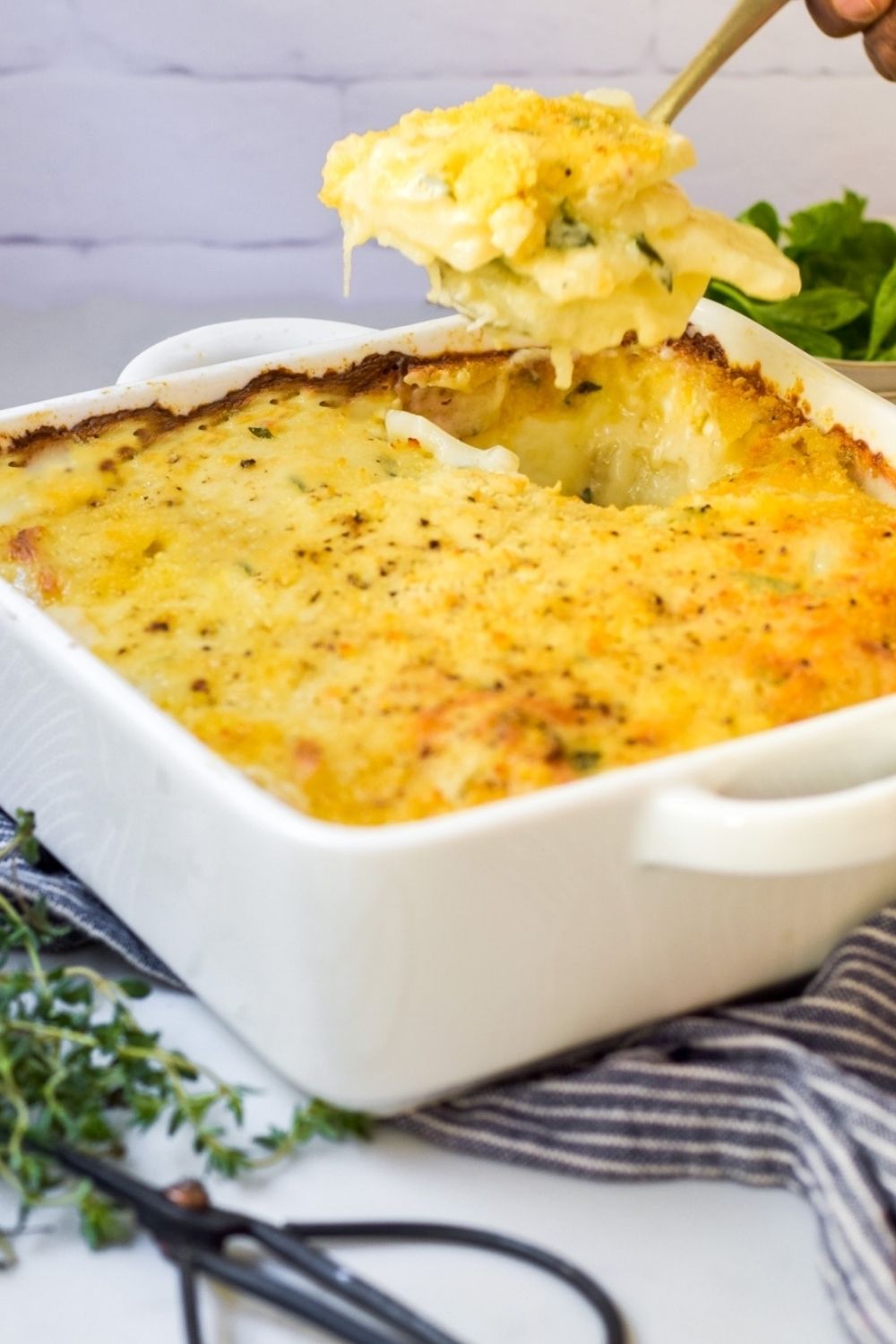 Scalloped Potatoes in a white dish