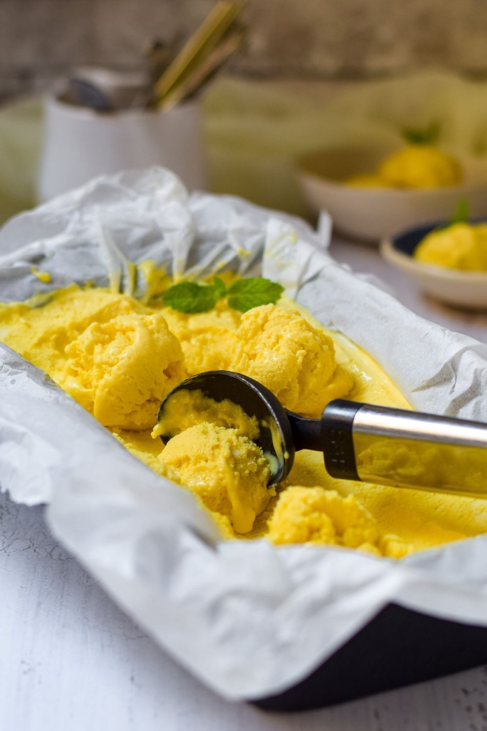 Mango Turmeric Ice Cream in a loaf pan