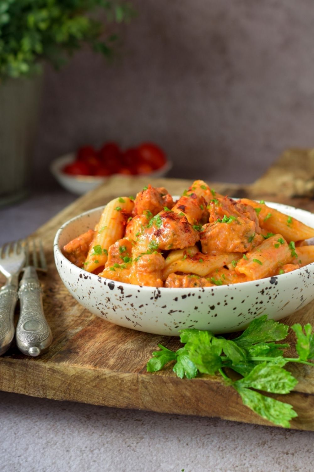 Creamy Tomato Chicken Pasta in a white bowl