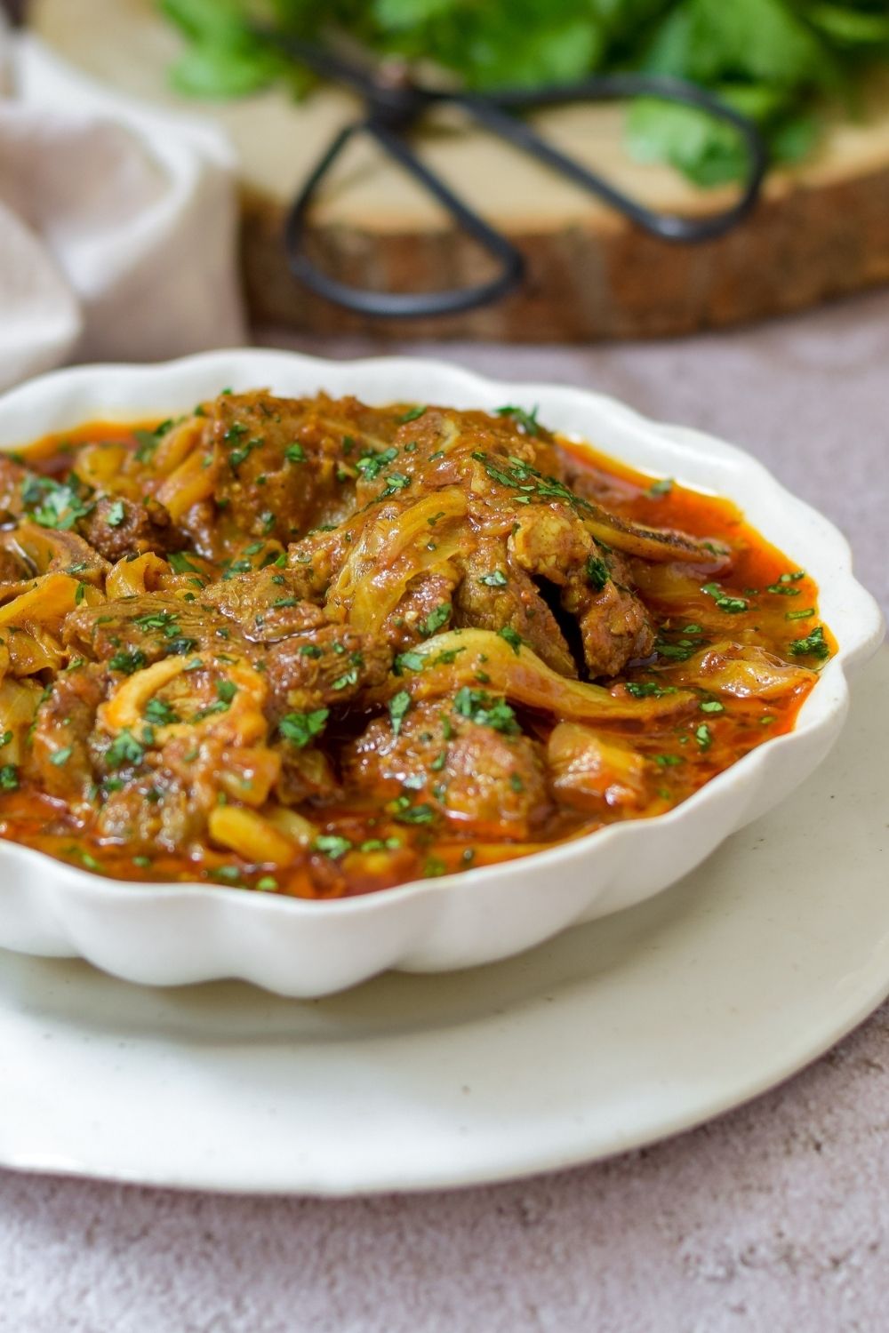 Lamb and Cabbage Curry in a white bowl