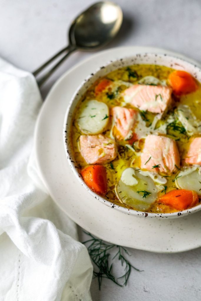 Finnish Salmon Soup with spoons at top left