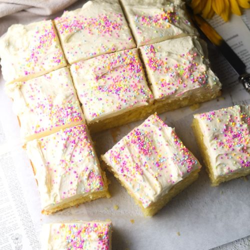 Vanilla Sponge Cake cut into squares on white paper