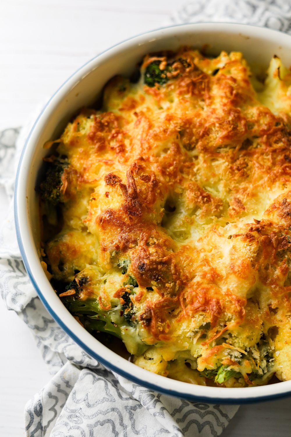 Cauliflower and Broccoli Bake in a white dish