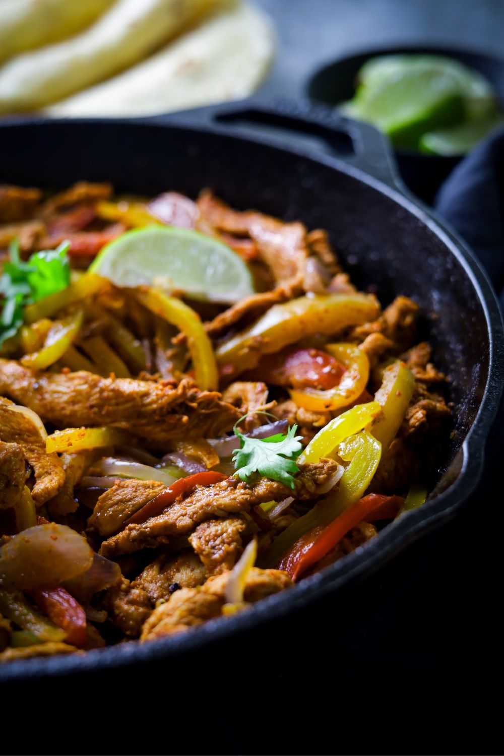Chicken Fajitas in a black pan